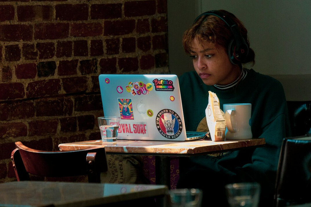 student studying with laptop